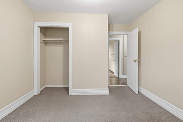 Carpeted bedroom with closet at 394 Alfred Street, Kingston