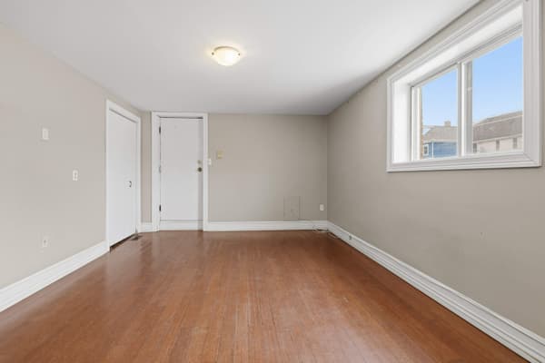Bedroom with large window at 394 Alfred Street, Kingston