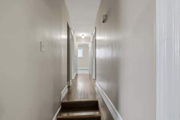 Hallway and stairs between floors at 394 Alfred Street, Kingston