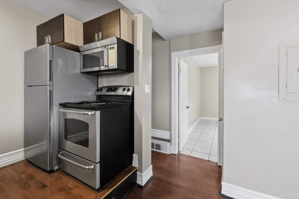 Kitchen with stainless range and microwave at 394 Alfred Street, Kingston
