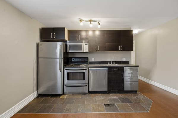 Kitchen with stainless appliances and dishwasher at 394 Alfred Street, Kingston
