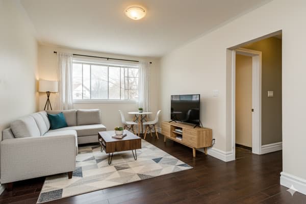 Staged rendering of a living room at 394 Alfred Street, Kingston