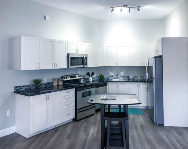 Model suite kitchen and dining area at 630 Princess Street, Kingston
