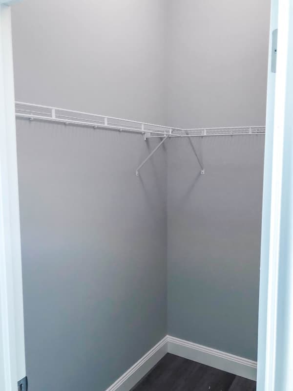Model suite walk-in closet at 630 Princess Street, Kingston